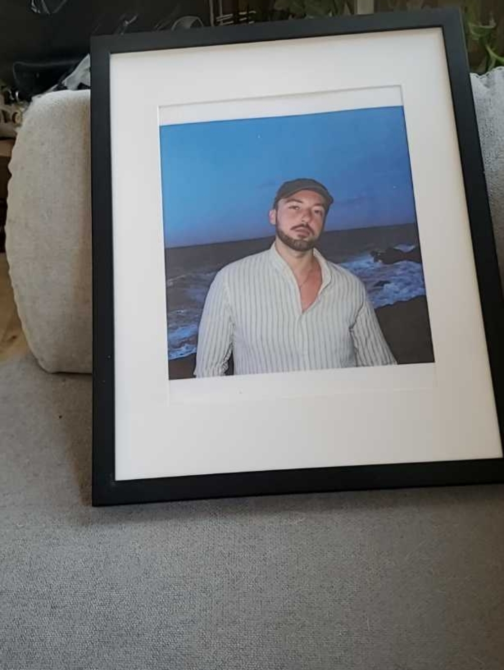 Photo Taken Of A Person With Ocean Background.